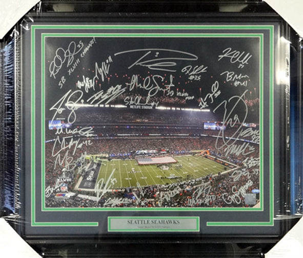 Seattle Seahawks Super Bowl XLVIII Champion Autographed Framed 16x20 Photo With 27 Signatures Including Russell Wilson, Marshawn Lynch & Richard Sherman MCS Holo Stock #90706